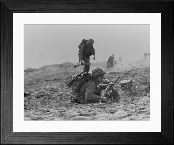 Framed Print : Marines advancing to inland Iwo Jima, on Feb. 20, 1945, the day after the first landings. World War 2. (BSLOC_2013_13_69)