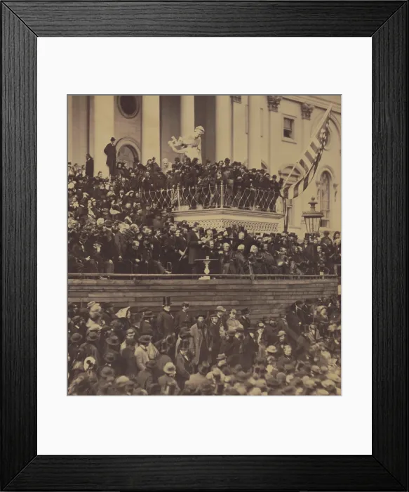 Framed Print : Abraham Lincoln delivering his second inaugural address on March 4, 1865. Lincoln stands in the center of the photo (below the flag and to the left), on the east front of the U.S