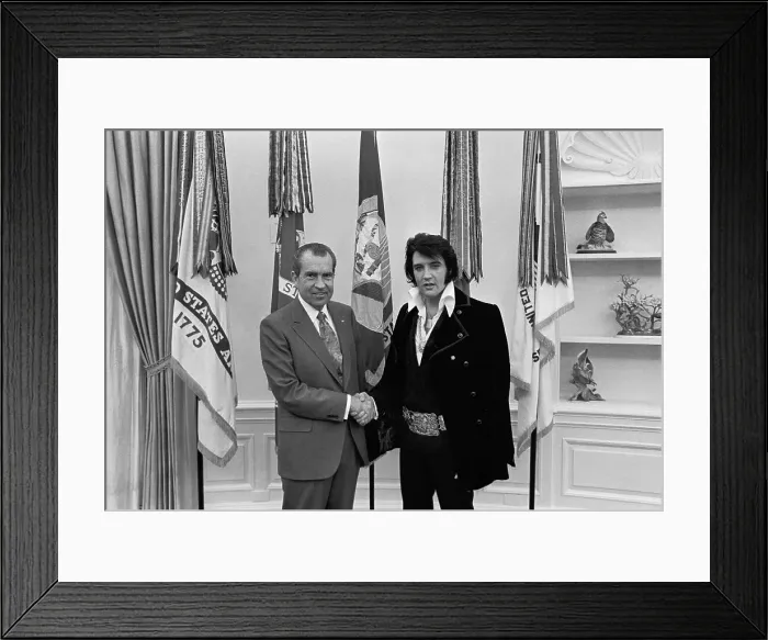 Framed Print : President Richard Nixon and Elvis Presley at the White House on Dec. 21 1970. Presley sought an appointment as a Federal Agent at Large to fight drugs and Communism Framed Print : President Richard Nixon and Elvis Presley at the White House on Dec. 21 1970. Presley sought an appointment as a Federal Agent at Large to fight drugs and Communism