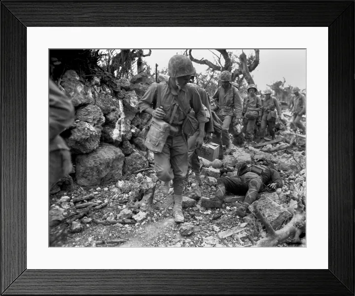 Framed Print : U.S. Marines pass through a small village where Japanese soldiers lay dead. Okinawa, April 1945. World War 2. (BSLOC_2013_13_84) Framed Print : U.S. Marines pass through a small village where Japanese soldiers lay dead. Okinawa, April 1945. World War 2. (BSLOC_2013_13_84)