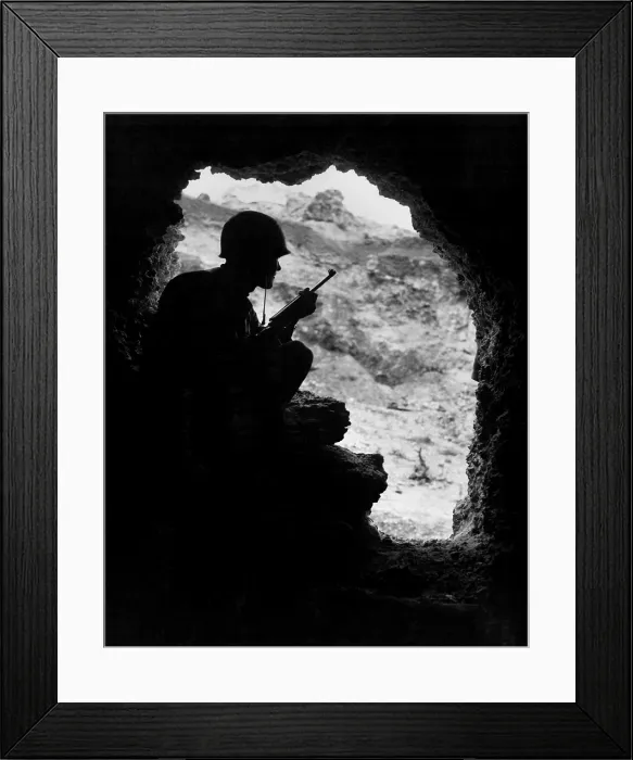Framed Print : Marine rifleman positioned in an cave to pick off Japanese snipers in the surrounding ridges. Battle of Okinawa, June 1945. World War 2. (BSLOC_2013_13_94)