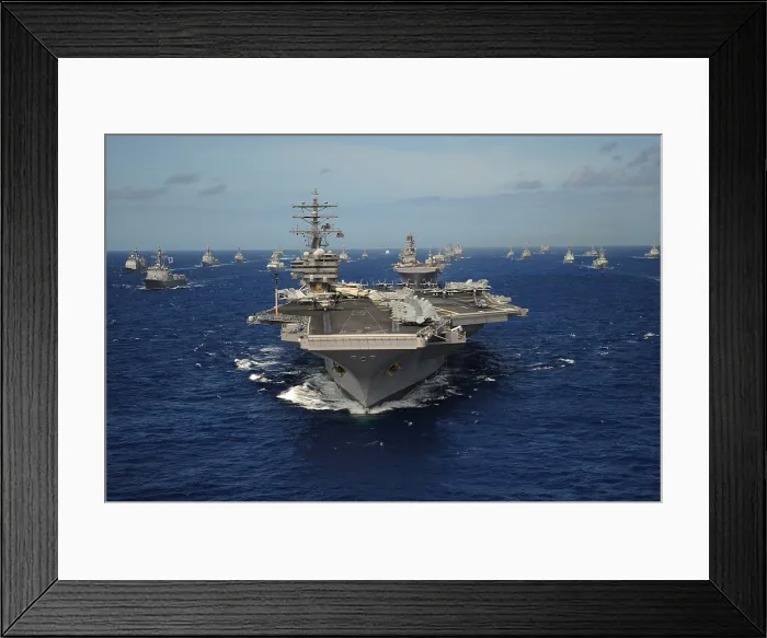 Framed Print : Aircraft carrier USS Ronald Reagan leads a formation of allied ships from through the Pacific Ocean. July 24 2010. (BSLOC_2011_12_253)