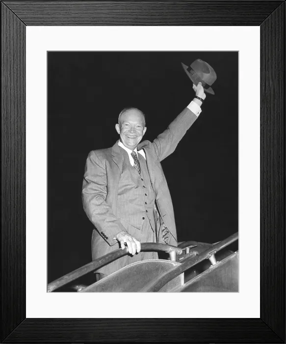 Framed Print : President Eisenhower waving his hat from airplane steps. He was traveling to Panama for a conference with Latin American leaders. July 20, 1956. - (BSLOC_2014_16_56)