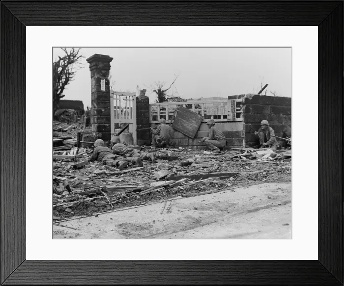 Framed Print : Marines fire at Japanese snipers concealed in the ruins of a building in Naha, Okinawa. Ca. June 1-10, 1945. World War 2. (BSLOC_2013_13_99)