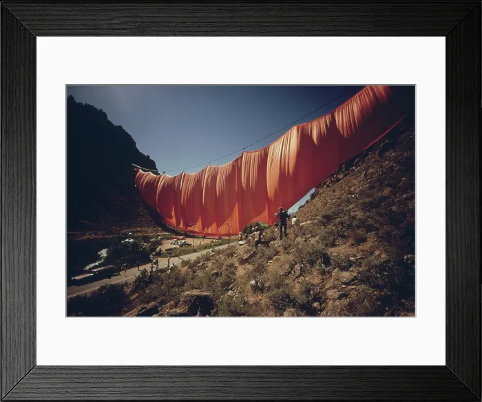 Framed Print : Artist Christo's 400 meter six-ton orange curtain across Rifle Gap in Colorado. The first installation on October 10 1971 was shredded by canyon winds