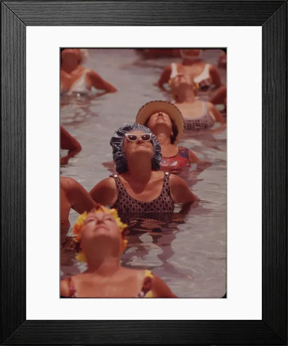 Framed Print : Senior women in organized daily exercises in one of the public pools at Century Village Retirement Community West Palm Beach Florida. Ca. 1973-75
