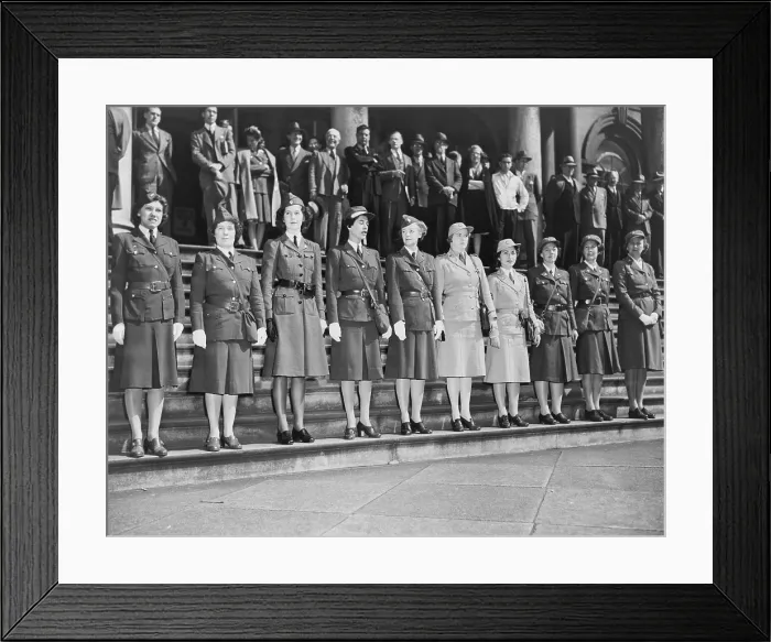 Framed Print : American Women's Voluntary Services, posed on steps, wearing various AWVS uniforms, 1942