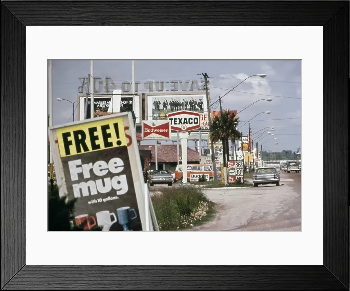 Framed Print : Billboards and advertising clutter a road in Real County Texas. June 1972 Framed Print : Billboards and advertising clutter a road in Real County Texas. June 1972