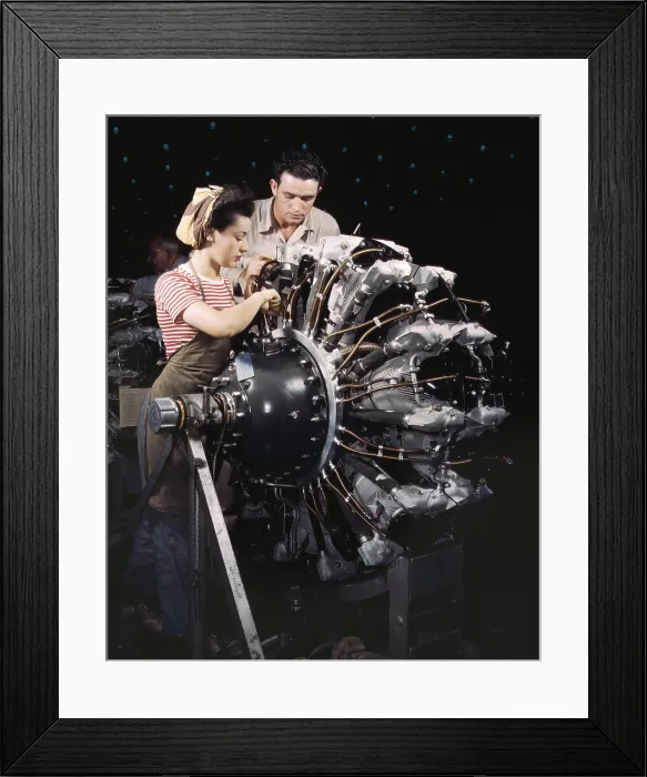 Framed Print : Woman war worker in training as an engine mechanic at Douglas Aircraft Company. Long Beach, California during World War 2, ca. 1942-45. (BSLOC_2013_14_118)