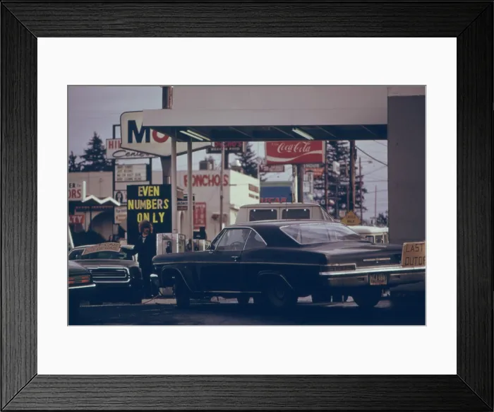 Framed Print : Even Numbers Only reads a sign after Oregon was the first US state to use a system of odd and even license plate numbers during the 1973-74 energy crisis