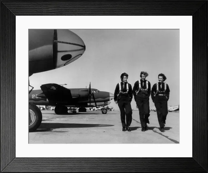 Framed Print : WASPs on flight line at Laredo AAF, Texas, Jan. 22, 1944. Over 1000 Women Air Force Service Pilots (WASP) freed male pilots for combat. World War 2. (BSLOC_2013_14_108) Framed Print : WASPs on flight line at Laredo AAF, Texas, Jan. 22, 1944. Over 1000 Women Air Force Service Pilots (WASP) freed male pilots for combat. World War 2. (BSLOC_2013_14_108)