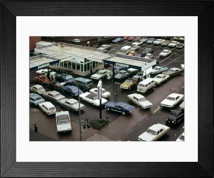 Framed Print : Bird's eye view of a gas station in Portland Oregon with cars lined up to receive only five gallons of fuel during the 1973-74 energy crisis Framed Print : Bird's eye view of a gas station in Portland Oregon with cars lined up to receive only five gallons of fuel during the 1973-74 energy crisis
