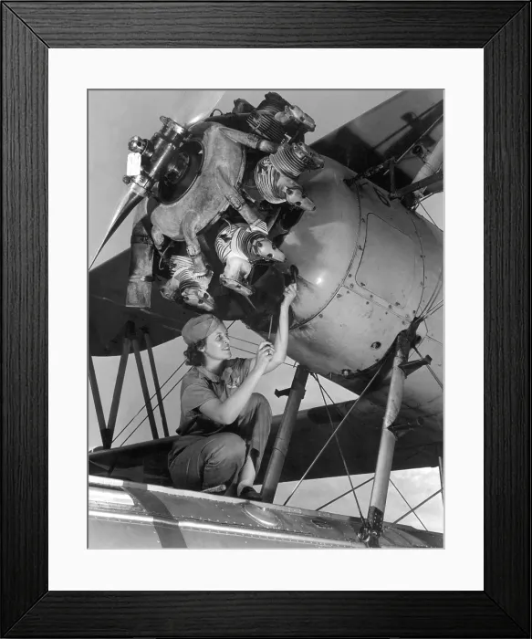 Framed Print : 20 year old women and expert aviation mechanic working on a Wright Whirlwind airplane motor. She rebuilt the engine at a Naval Air Base, Oct. 1942. (BSLOC_2013_14_110) Framed Print : 20 year old women and expert aviation mechanic working on a Wright Whirlwind airplane motor. She rebuilt the engine at a Naval Air Base, Oct. 1942. (BSLOC_2013_14_110)