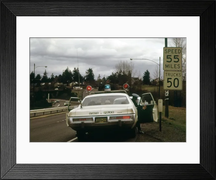 Framed Print : Oregon State Police stops a driver who exceeded the new 55 MPH national speed limit imposed to conserve gasoline. Dec. 1973 Framed Print : Oregon State Police stops a driver who exceeded the new 55 MPH national speed limit imposed to conserve gasoline. Dec. 1973
