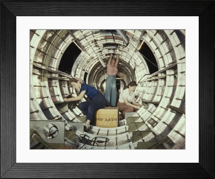 Framed Print : Women workers install fixtures and assemblies to a tail fuselage section of a B-17 bomber. Douglas Aircraft Company plant, Long Beach, California, during World War 2, Oct. 1942