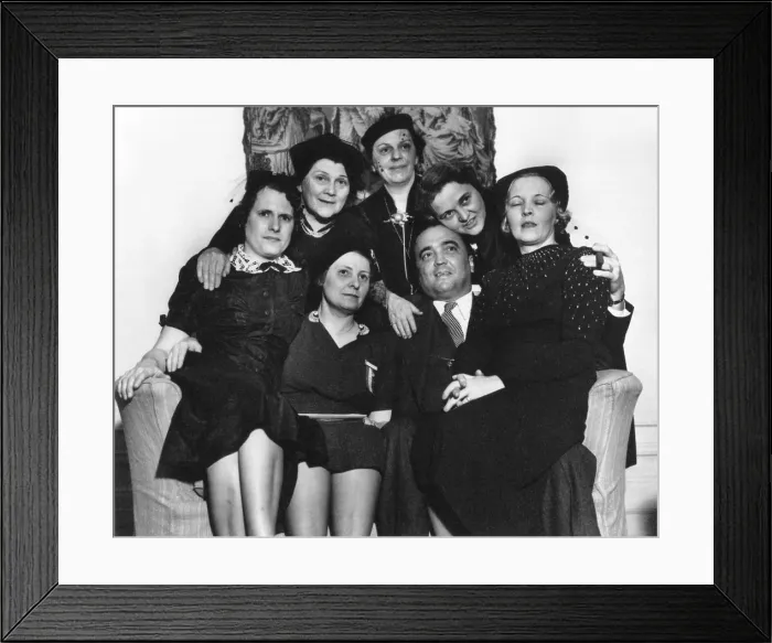 Framed Print : FBI Director J. Edgar Hoover on a loveseat with six women at the Willard Hotel, Washington, D.C Framed Print : FBI Director J. Edgar Hoover on a loveseat with six women at the Willard Hotel, Washington, D.C