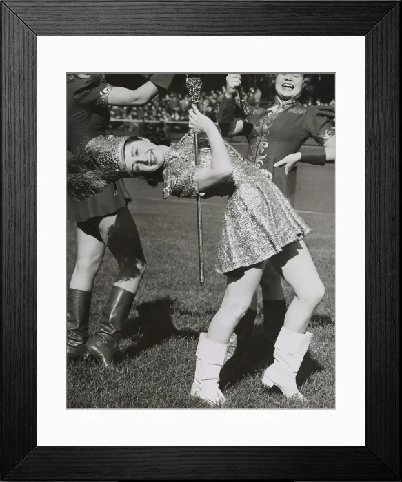 Framed Print : Lead majorette, doing a back bend while holding a baton. Nov. 22, 1939. New York City. (BSLOC_2015_14_215)