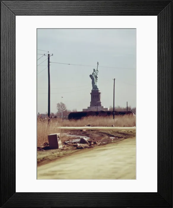 Framed Print : Statue of Liberty seen from the dump in New Jersey that will become Liberty State Park that opened June 14 1976 Framed Print : Statue of Liberty seen from the dump in New Jersey that will become Liberty State Park that opened June 14 1976