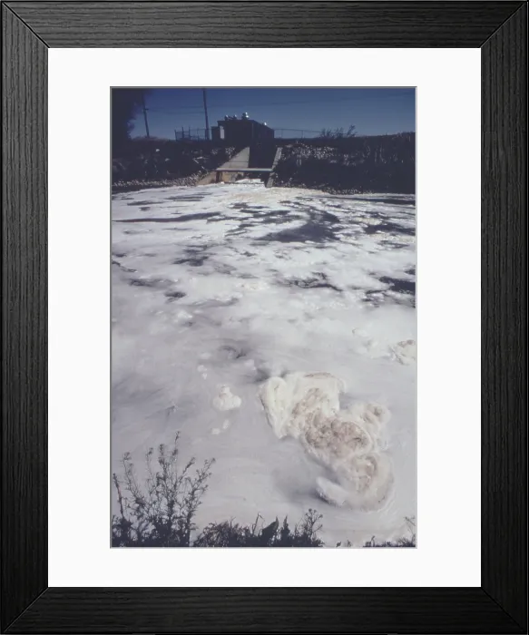 Framed Print : Discharge from a water treatment plant into the South Platte River. Ca 1973-75