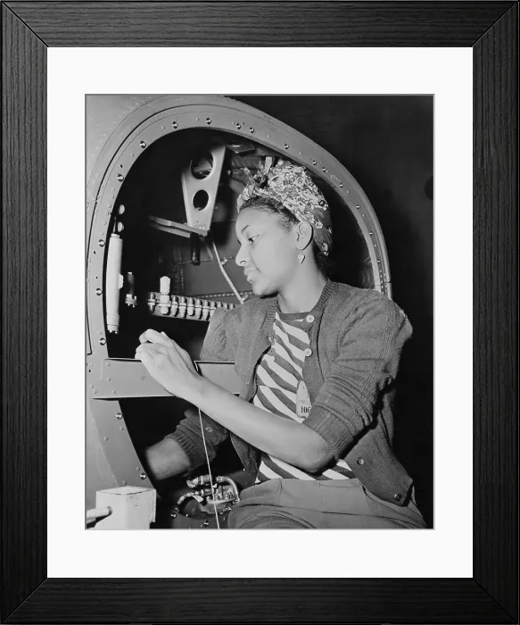 Framed Print : African American woman war worker at Douglas Aircraft Company. Long Beach Plant, California, during World War 2, ca. 1942-45. (BSLOC_2013_14_132)