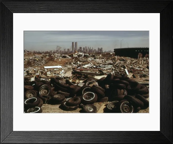 Framed Print : An illegal dump in New Jersey with a view of Lower Manhattan skyline defined by the new Twin Towers of the World Trade Center. Ca. 1973-75 Framed Print : An illegal dump in New Jersey with a view of Lower Manhattan skyline defined by the new Twin Towers of the World Trade Center. Ca. 1973-75