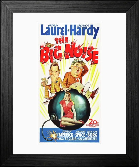 Framed Print : THE BIG NOISE, top l-r: Stan Laurel, Oliver Hardy, center: Doris Merrick on poster art, 1944, TM and Copyright 20th Century Fox Film Corp