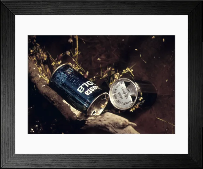 Framed Print : Aluminum soda cans litter the Oregon landscape even after the state established a 5-cent deposit on the recyclable cans. Ca. 1973-75 Framed Print : Aluminum soda cans litter the Oregon landscape even after the state established a 5-cent deposit on the recyclable cans. Ca. 1973-75
