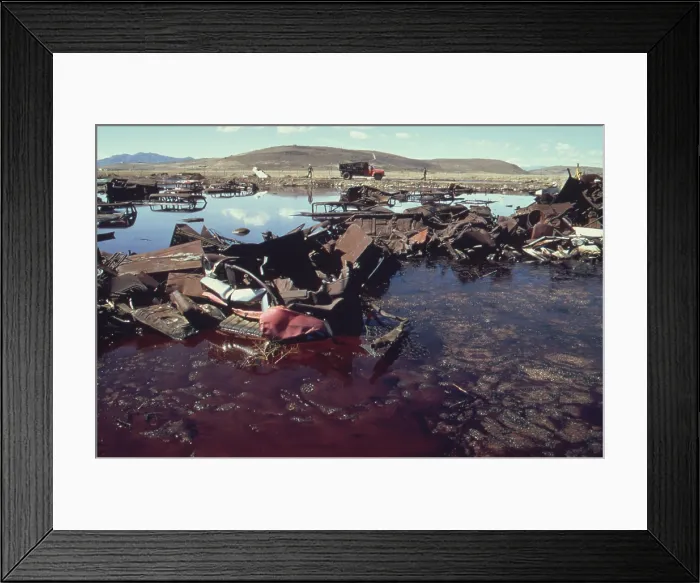 Framed Print : A five acre pond so polluted with junked autos acid and oil it threatened to contaminate the nearby Great Salt Lake and a wildlife refuge