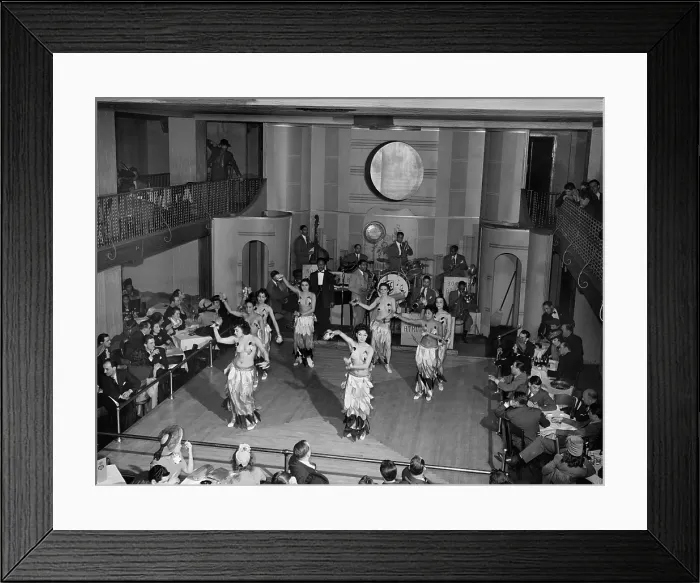 Framed Print : Exotically costumed dancers at a Chicago African American cabaret, April 1941. Most of the audience are white. Photo by Russell Lee. (BSLOC_2013_8_131)