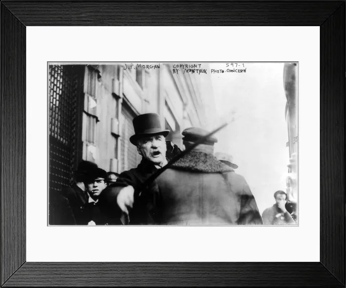 Framed Print : J.P. Morgan striking photographer with cane. 1910