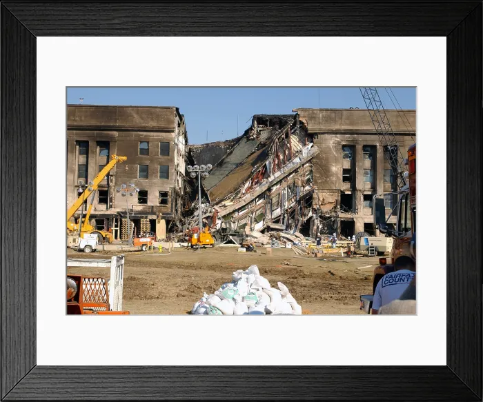 Framed Print : The Pentagon on Sept.13 2001 was damaged by two days earlier by the 9 / 11 crash of a hijacked jetliner crash by Al-Qaeda errorists. Photo by: Everett Collection (BSLOC_2011_6_17)