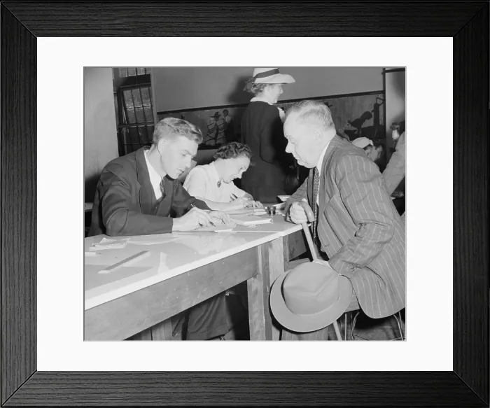 Framed Print : Sugar ration applicant gave his name and address to school teacher who issued his ration card. He was limited to one pound every two weeks during World War 2. May 1942