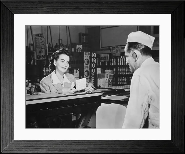 Framed Print : How many points will it take?, a shopper asks before she buys food during World War 2 Framed Print : How many points will it take?, a shopper asks before she buys food during World War 2