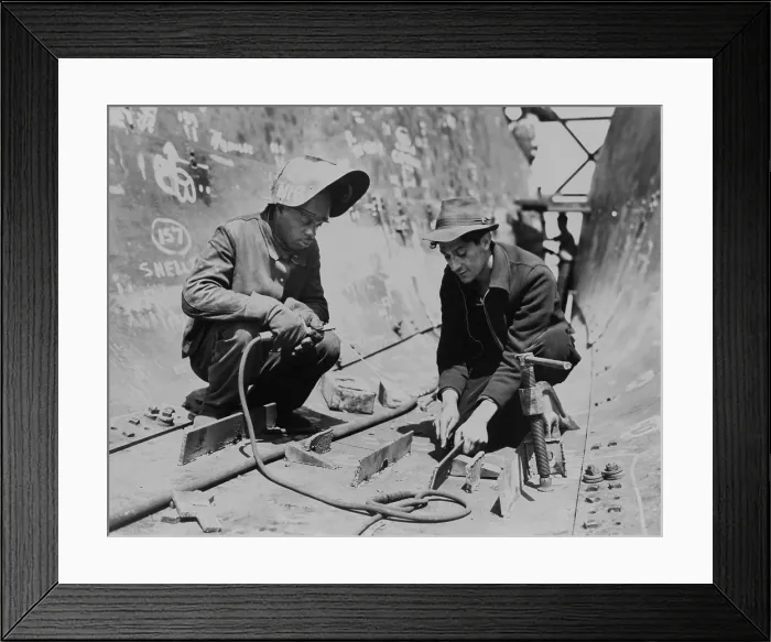 Framed Print : African Americans at the Bethlehem-Fairfield shipyards, building the SS Frederick Douglas. Electric welders Walter Norman and Louis Grisanti on building the Liberty ship