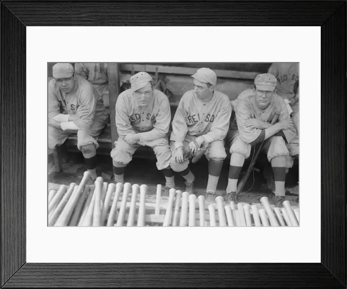 Framed Print : Boston Red Sox players sitting in their dugout, 1915. L-R: Babe Ruth, Bill Carrigan, Jack Barry, Vean Gregg. (BSLOC_2015_17_20)