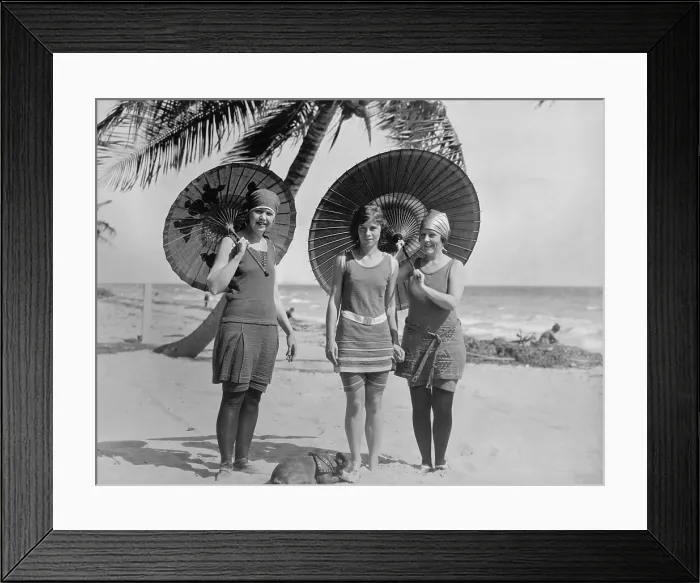 Framed Print : Women pose in bathing suits at an American east coast beach between 1910-1920. The younger woman in the center has bare legs, but the others wear stockings. (BSLOC_2015_17_201) Framed Print : Women pose in bathing suits at an American east coast beach between 1910-1920. The younger woman in the center has bare legs, but the others wear stockings. (BSLOC_2015_17_201)