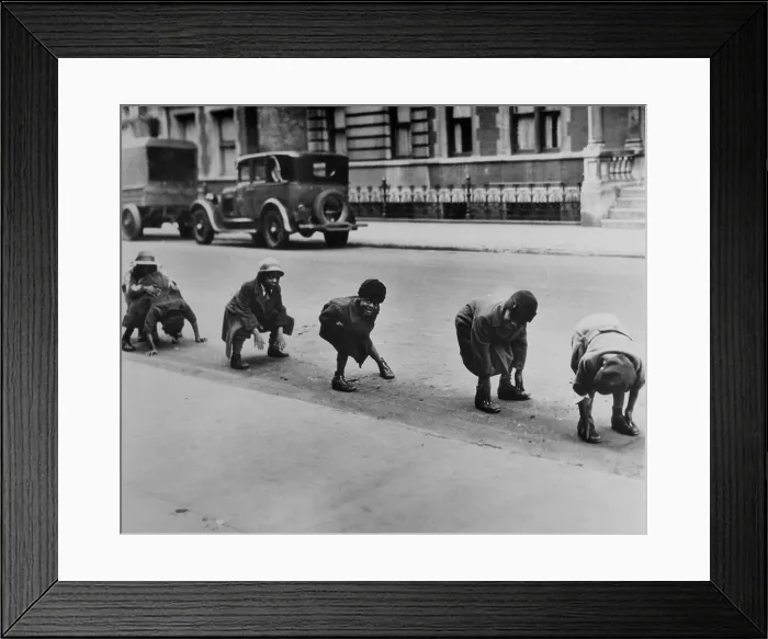 Framed Print : African American children playing leap frog in a Harlem street, ca. 1930. (BSLOC_2013_8_136)