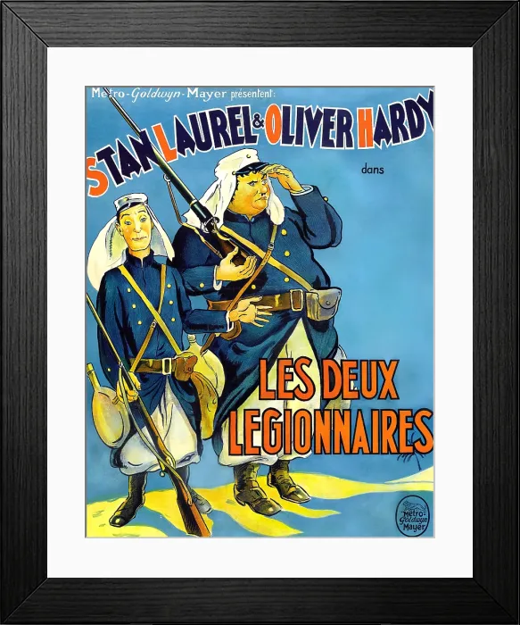 Framed Print : BEAU HUNKS, (aka LES DEUX LEGIONNAIRES), from left: Stan Laurel, Oliver Hardy on French poster art, 1931