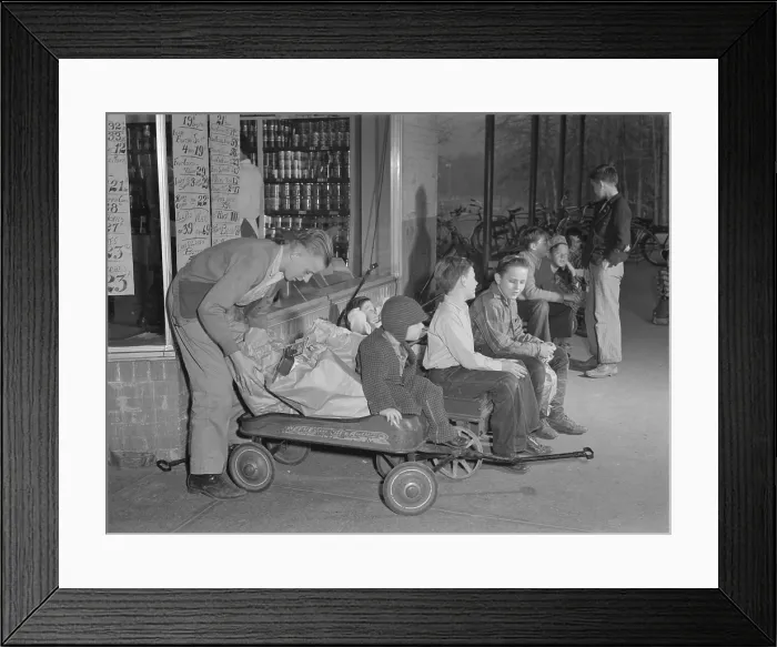 Framed Print : Youngsters hiring out their express wagons to haul groceries in suburban Greenbelt, Maryland. World War 2 tire and gasoline rationing created this business opportunity. Nov. 1942