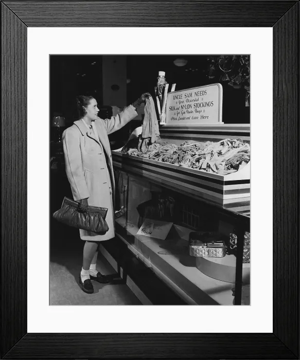 Framed Print : Collection point for worn out silk stockings during World War 2. They were needed for recycling into powder bags for naval and coast defense artillery. Ca. 1942-45 Framed Print : Collection point for worn out silk stockings during World War 2. They were needed for recycling into powder bags for naval and coast defense artillery. Ca. 1942-45