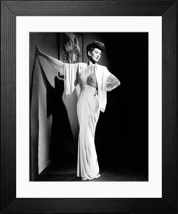 Framed Print : WHAT A WOMAN!, Rosalind Russell, in a crystal-beaded jersey gown by Travis Banton, 1943