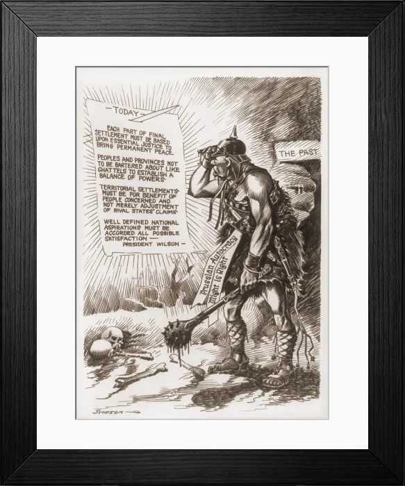 Framed Print : World War 1 cartoon of a barbaric Prussian soldier looks towards a bright light emanating from a document which paraphrases President Wilson's Fourteen Points