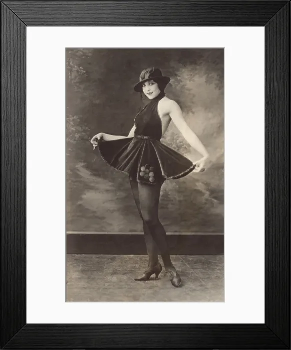 Framed Print : The Entertainer, a photo-postcard, of a full-length portrait of a woman wearing hat, short skirt and dark sheer tights. Dec. 14, 1921. (BSLOC_2015_17_218) Framed Print : The Entertainer, a photo-postcard, of a full-length portrait of a woman wearing hat, short skirt and dark sheer tights. Dec. 14, 1921. (BSLOC_2015_17_218)