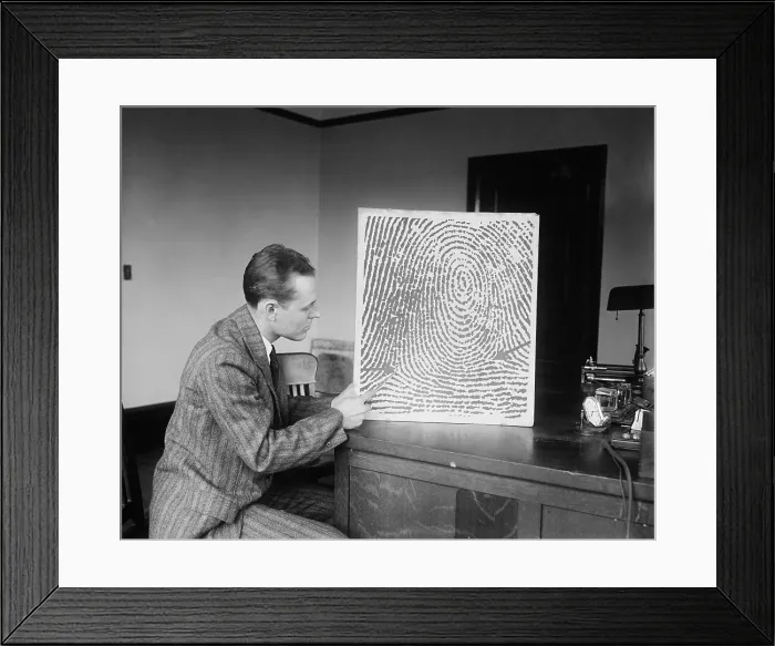 Framed Print : Demonstration of a fingerprint reconstructed from a verbal description received by telephone or telegraph, Jan. 13, 1930. (BSLOC_2013_8_157)