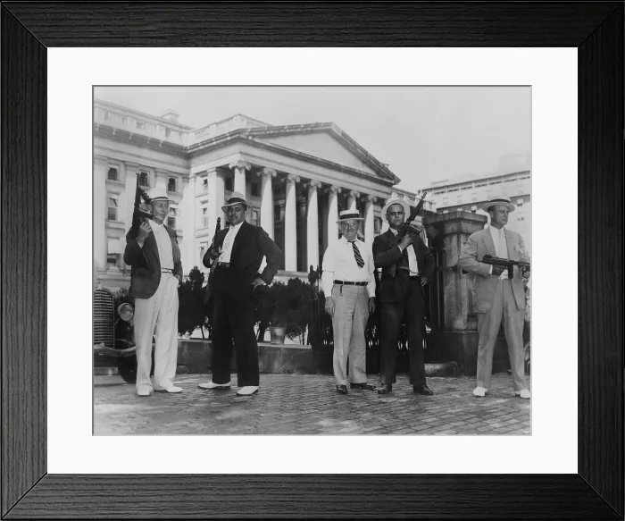 Framed Print : Treasury Dept. guards shipment of silver dollars from Philadelphia mint, 1935. The machine gun armed agents stand outside the Treasury building. (BSLOC_2013_8_161) Framed Print : Treasury Dept. guards shipment of silver dollars from Philadelphia mint, 1935. The machine gun armed agents stand outside the Treasury building. (BSLOC_2013_8_161)