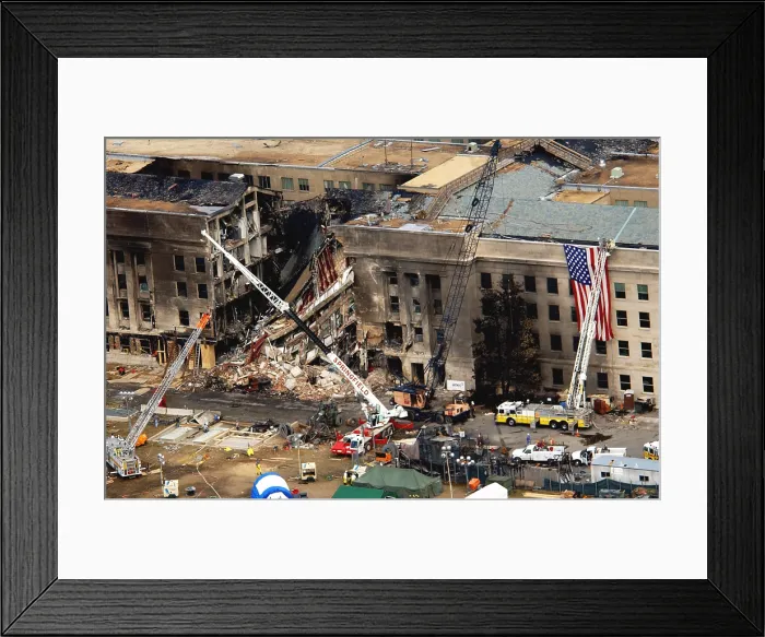 Framed Print : The Pentagon showing the impact point two days after a hijacked American Airlines Flight 77 was crashed into the building on Sept. 11 2001