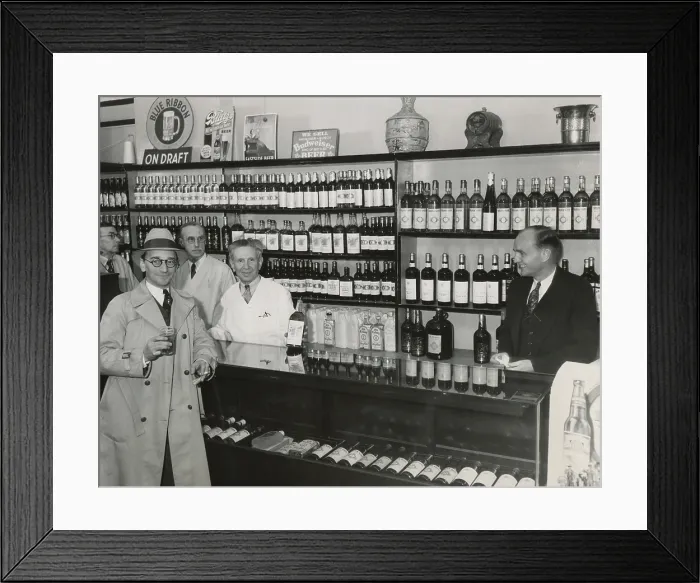 Framed Print : A well stocked Los Angeles liquor store awaits Prohibition's repeal, Dec. 6, 1933. His stock ran out shortly after the doors were opened. (BSLOC_2013_8_153)