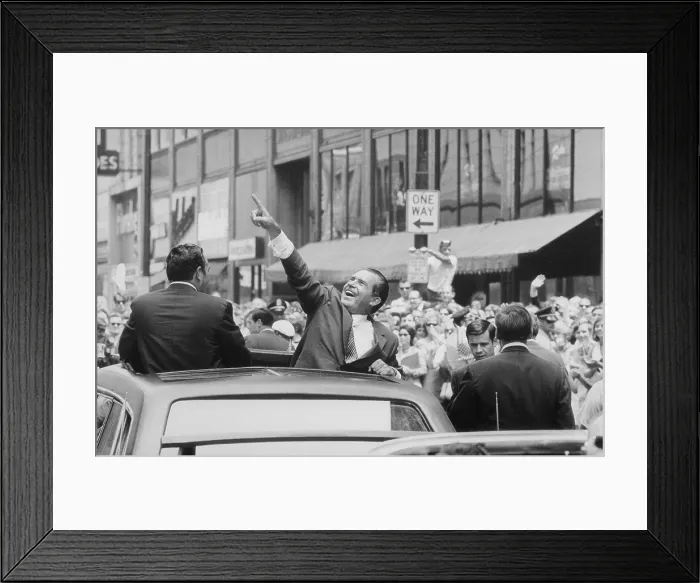 Framed Print : President Nixon pointing at the crowd from the roof of his car during a motorcade. Ca. 1969-1974 Framed Print : President Nixon pointing at the crowd from the roof of his car during a motorcade. Ca. 1969-1974