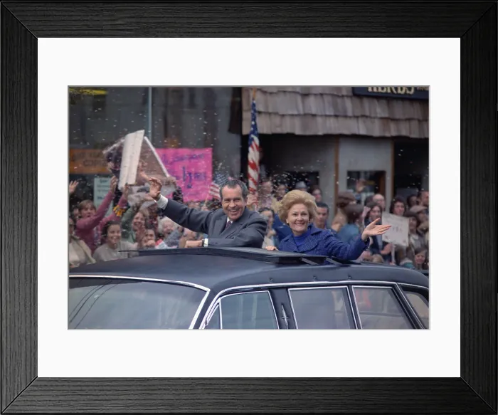 Framed Print : Nixon 1972 Re-election Campaign. President and Pat Nixon wave from the sun roof of their limousine in a motorcade through New Rochelle N.Y. Oct. 24 1972