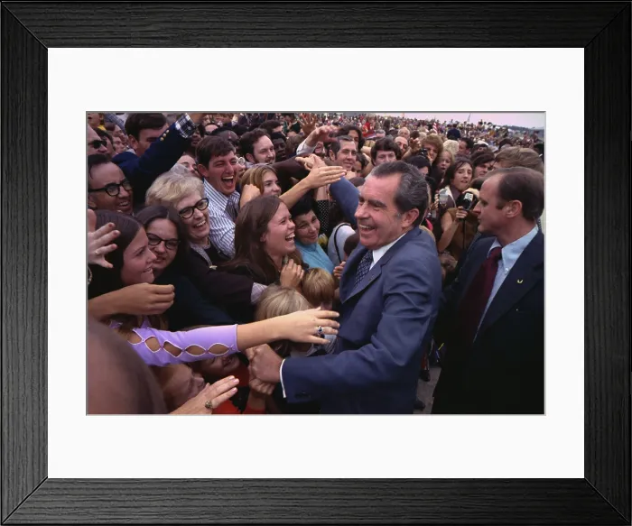 Framed Print : Nixon works a crowd of supporters at Robins Air Force Base Georgia. Nov. 18 1973